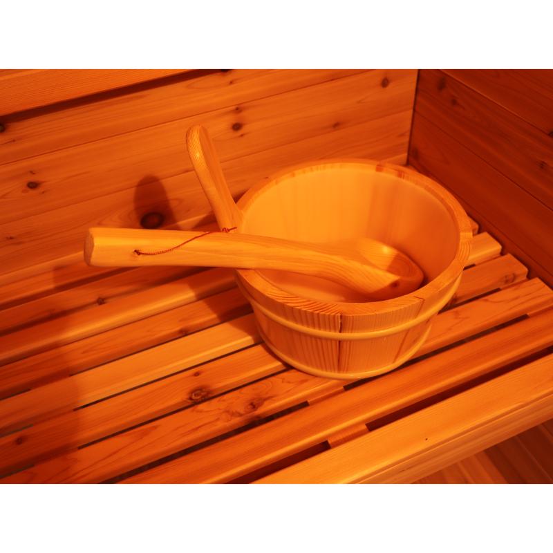 SunRay Denali HL400DS Outdoor Home Sauna - close up view of the bucket and ladle sitting on the bench.