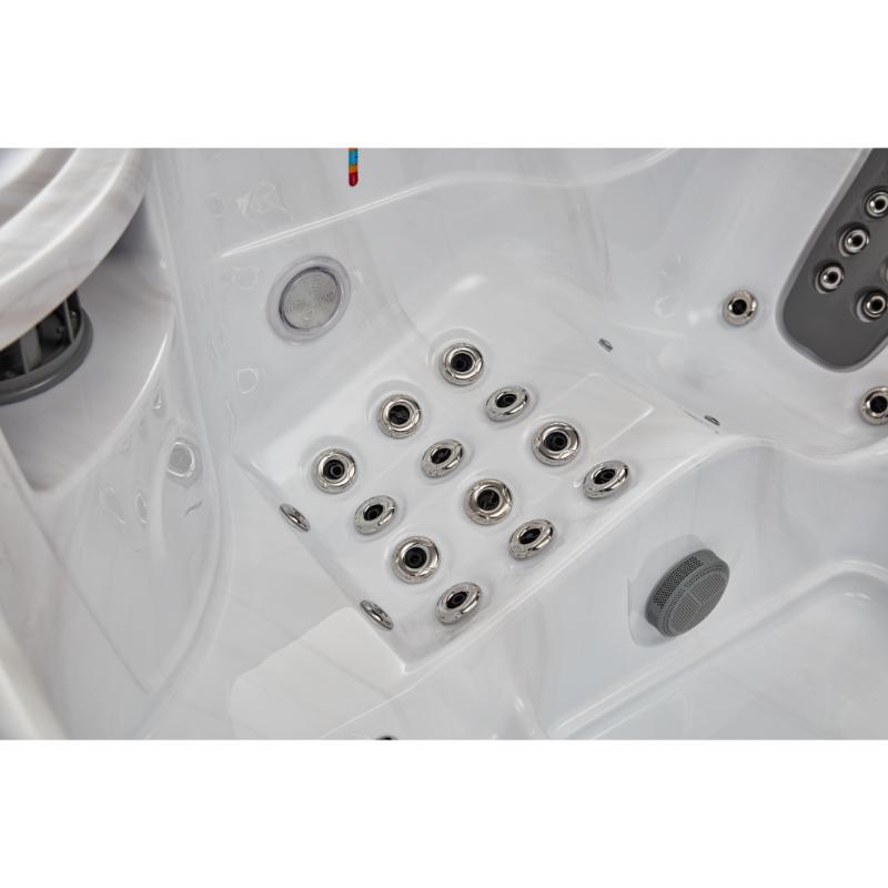 Estes 5 Person Hot Tub - close up view of calf jets for a lounge seat.