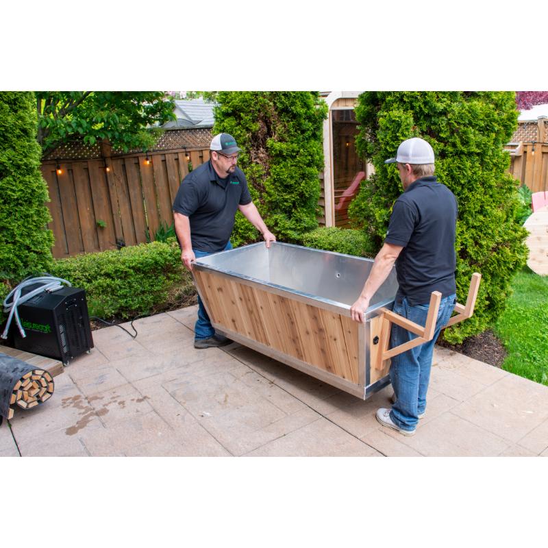 Polar Cold Plunge Tub-two men placing the tub