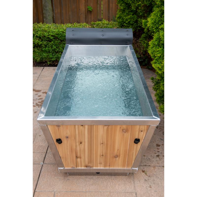 Polar Cold Plunge Tub-roll cover rolled back, showing water in the tub