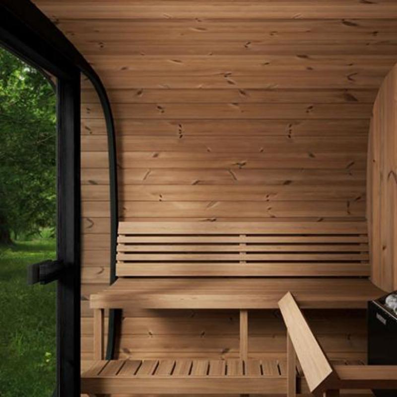 Sauna Life CL7G Home Cube Sauna - interior view of one of the side walls and bench, with a glimpse of the green backyard view out the glass front wall and door.