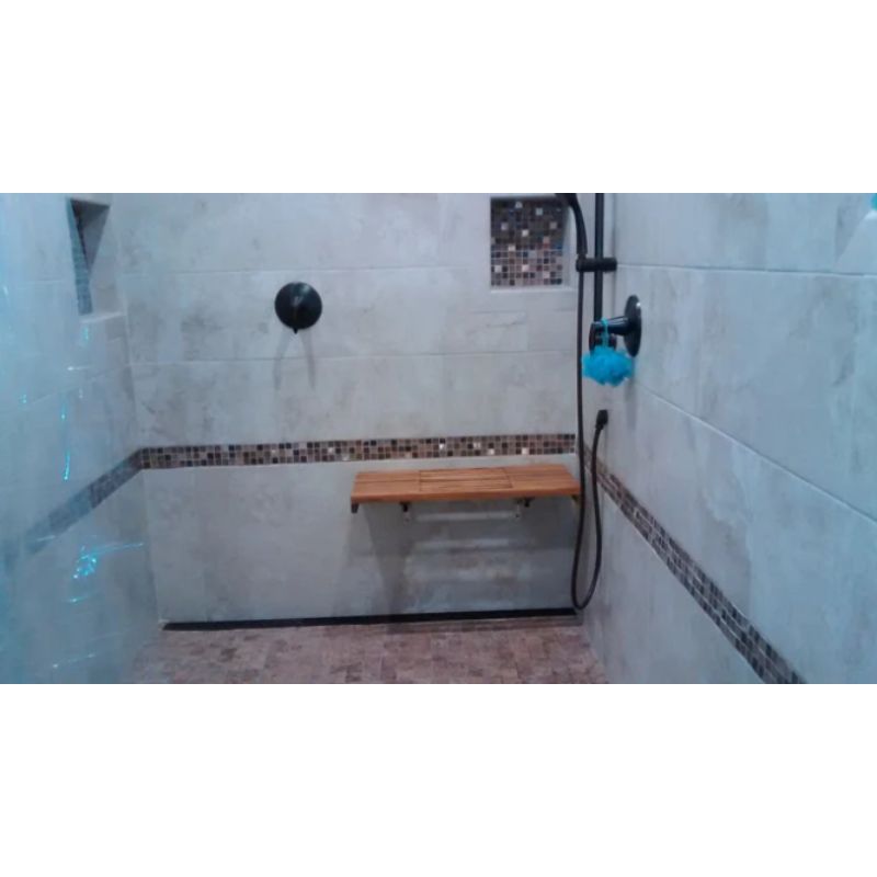 Wall Mount Fold Down Teak Bench with Slot Openings - installed in a shower