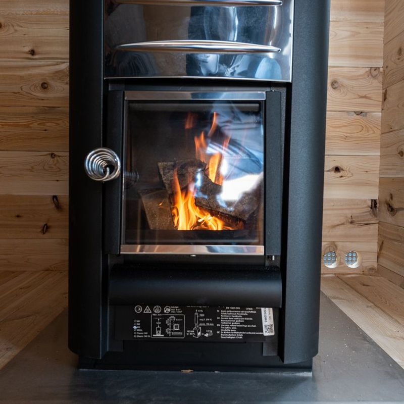 Dundalk LeisureCraft Georgian Outdoor 6 Person Steam Sauna - - close up of wood burning stove