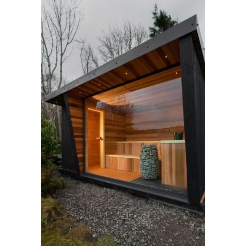 HUUM HIVE Mini HIVEMINI60-240/1 Electric Sauna Stove - outside view of outdoor sauna, showing the heater