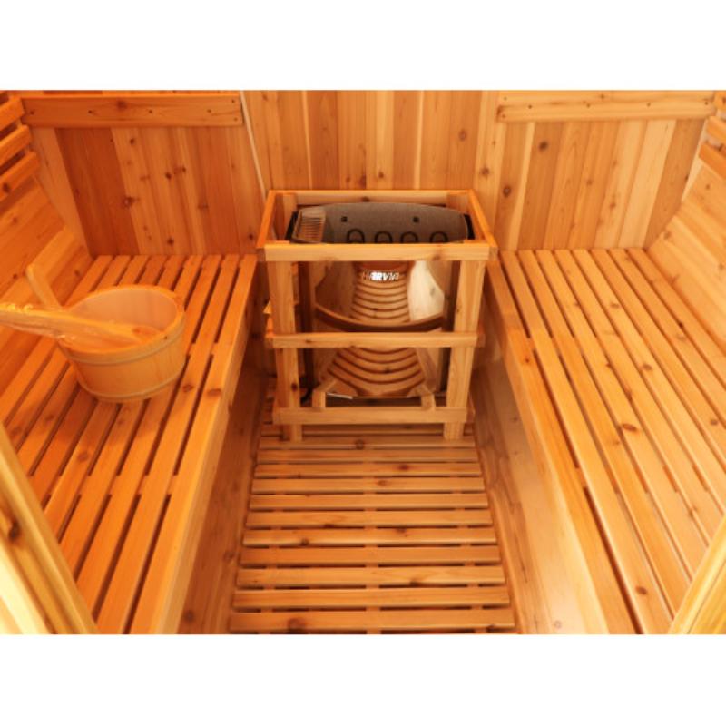 Aurora traditional barrel sauna - heater between benches and bucket on the bench