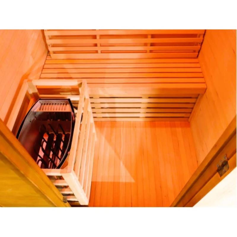 Sunray Eagle 200D1 Outdoor Traditional Steam Sauna - interior view of the bench and the sauna heater to the left without rocks in it.