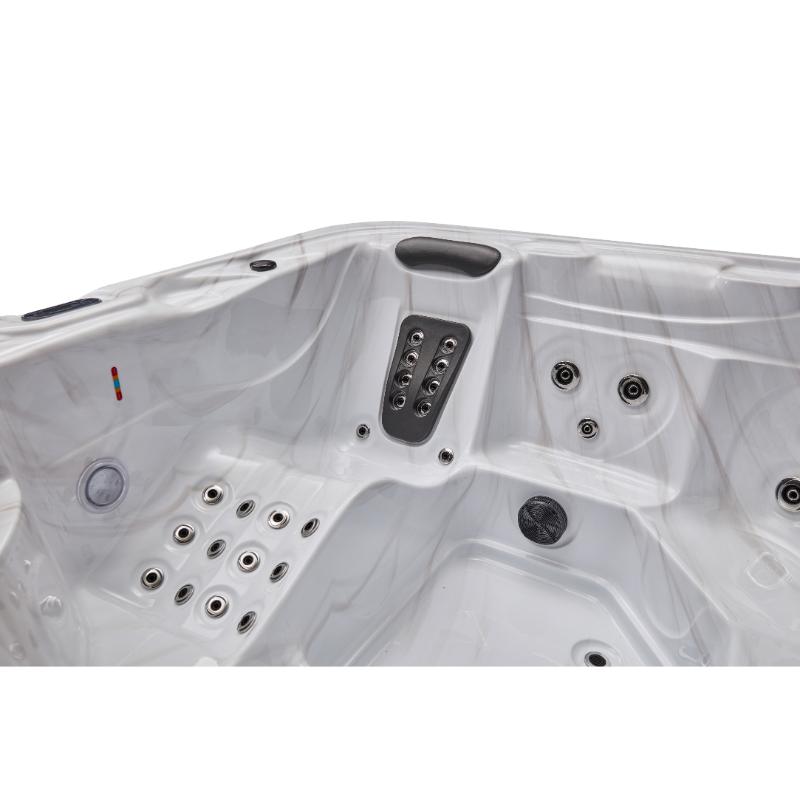 Estes 5 Person Hot Tub - view of a seat lounger with jets for the back and calves.