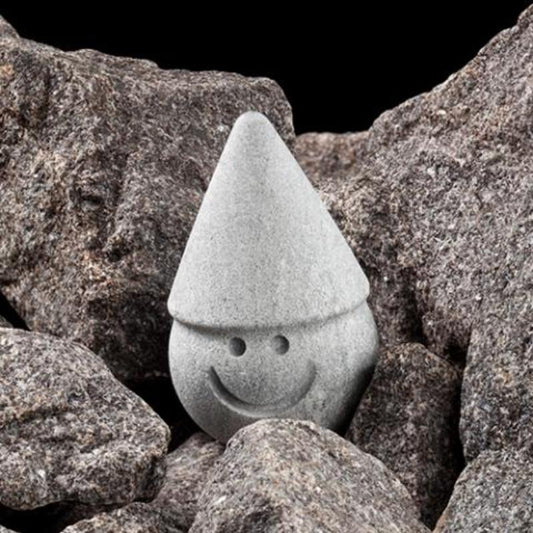 Hukka Tahvo - Sauna Elf with Cone Hat in rocks