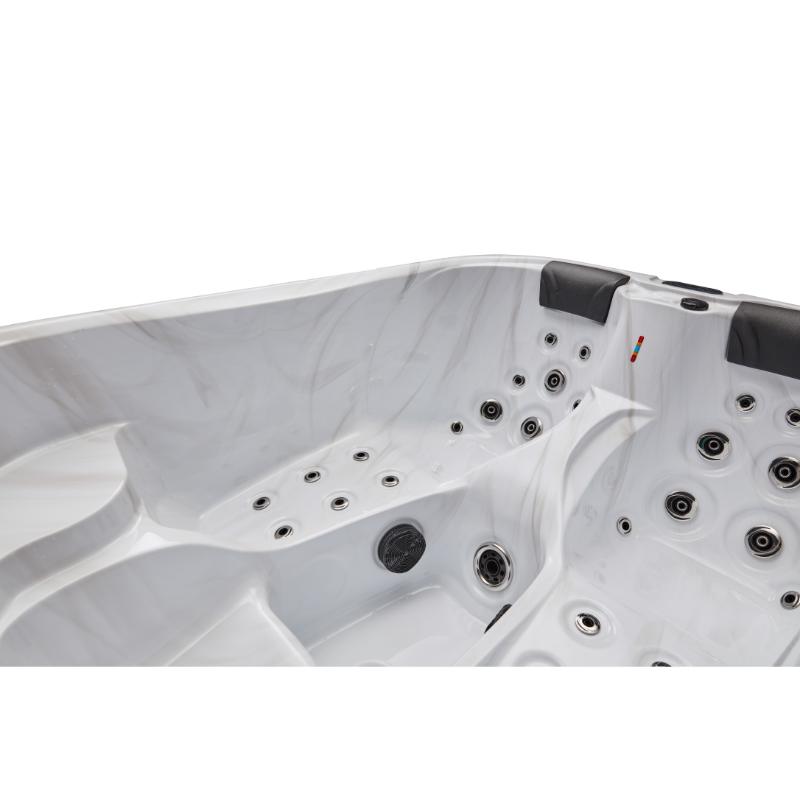 Largo 3 Person Hot Tub - showing an angled side view of the curves of the seat and the jets. No water.