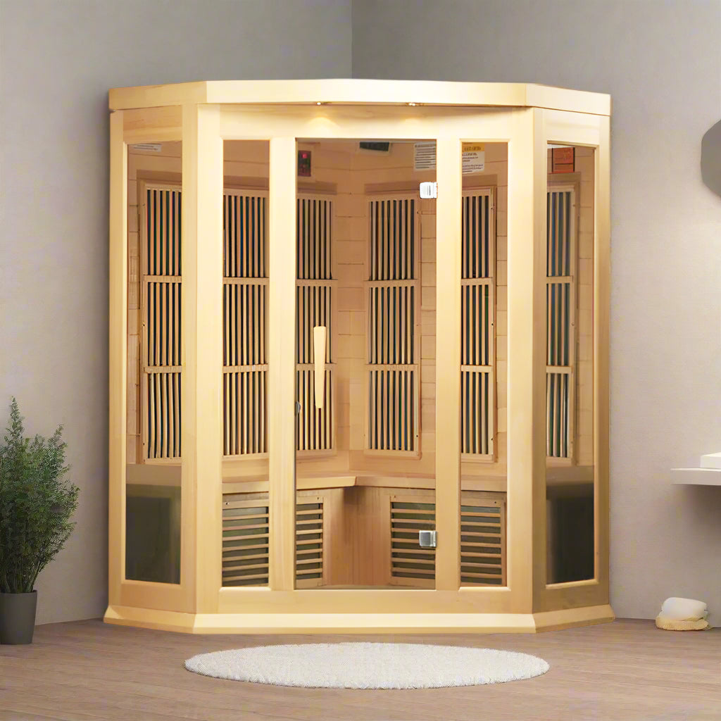 Maxxus MX-K356-01 | 3 Person Corner Low EMF FAR Indoor Infrared Sauna - full front view, in a bathroom with a vanity on the right and a plant on the left.