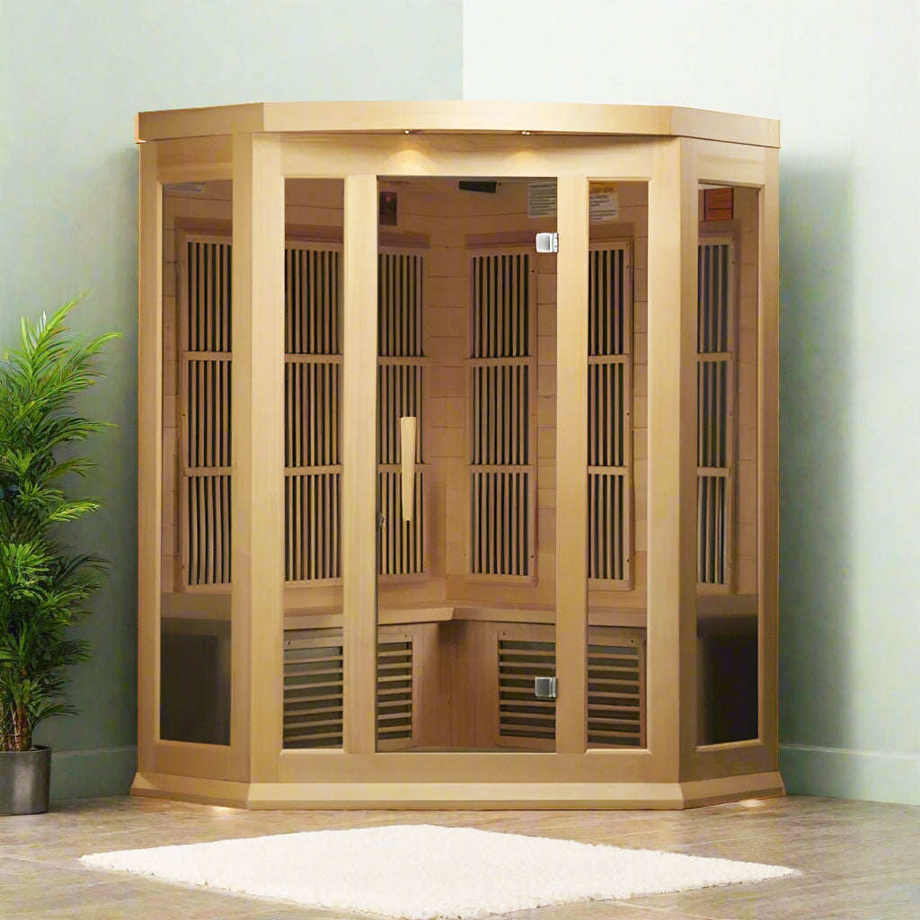 Maxxus MX-K356-01 Indoor Corner Infrared Sauna - showing a rug in front and a plant to the left.