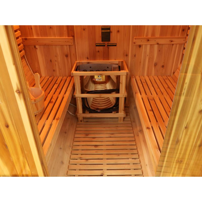 Oasis barrel sauna - interior heater between benches and flat floor