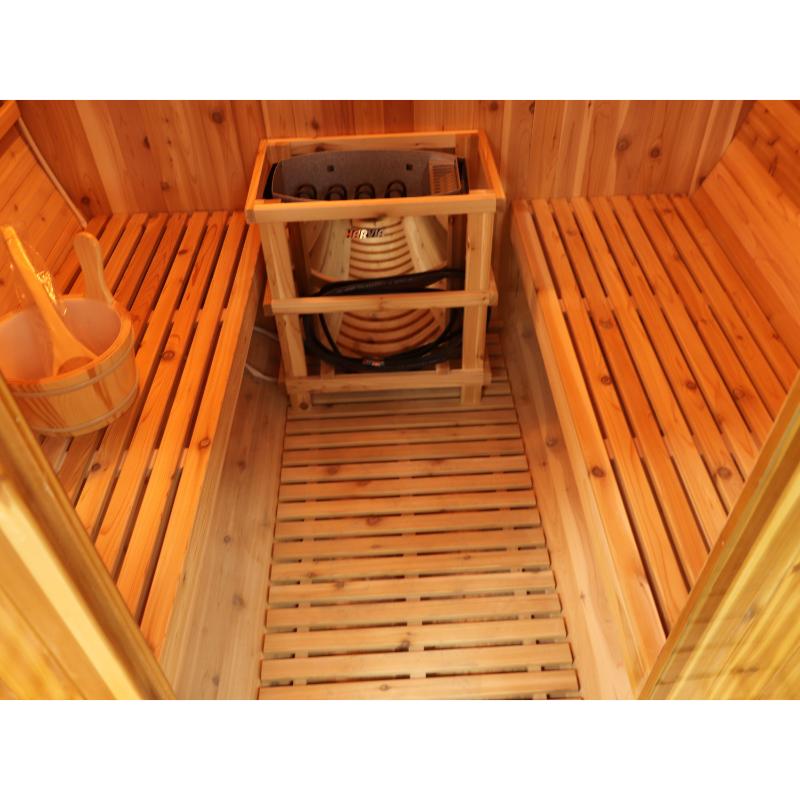 Oasis barrel sauna - another angle of the heater and floor and interior bench