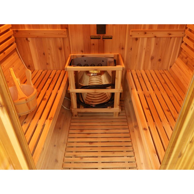 Oasis barrel sauna - another view of interior and bucket and ladle on left bench