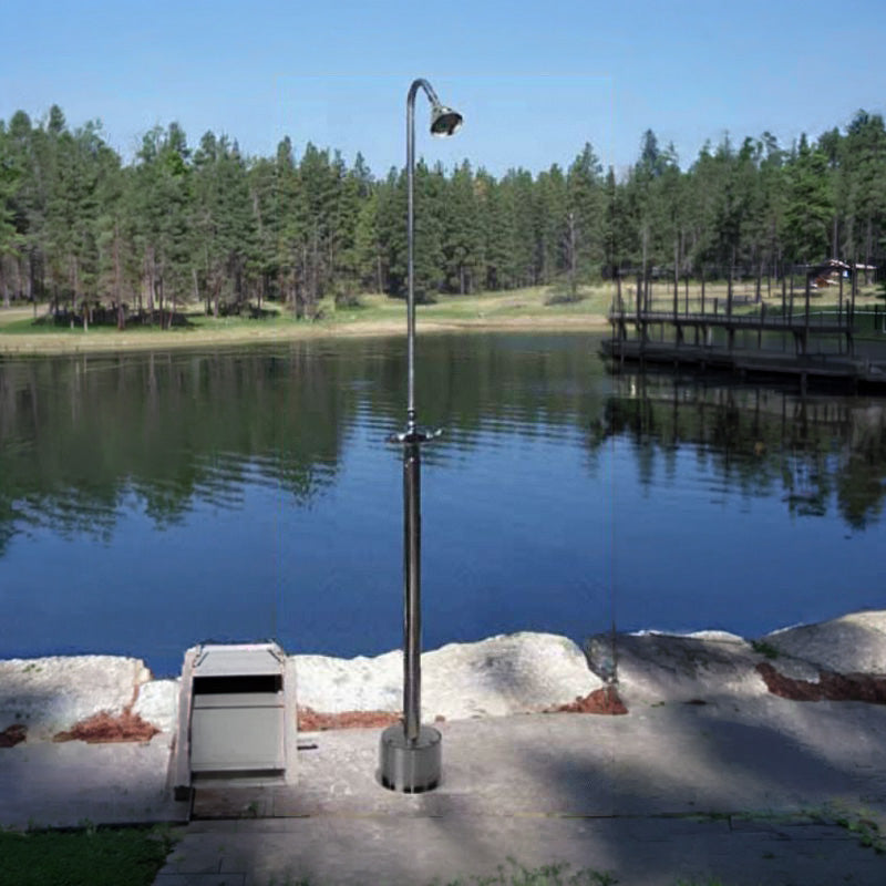 3" Shower Head Freestanding Hot/Cold Outdoor Shower - ADA Compliant | HC-4000, installed on a concrete pad beside a lake.