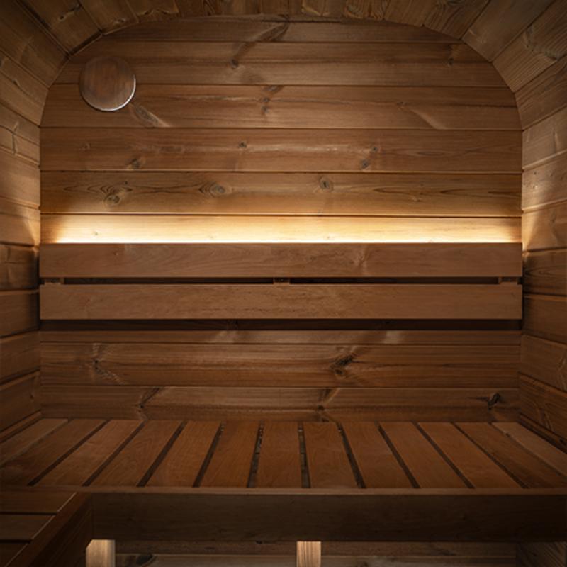 Single zone lighting kit - the interior view of a sauna and the wooden wall with a bench with horizontal backlighting