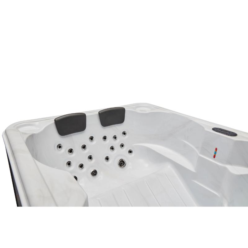 Regal 4 Person Hot Tub - view of tub interior towards one end. Showing 2 seats and jets.