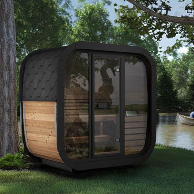 Sauna Life  CL4G Home Cube Sauna - full angled view, lakeside under a tree with reflections in the glass wall and door