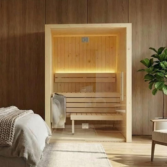 SaunaLife-X2 traditional sauna in a bedroom beside a bed