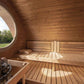 Sauna Life G11 Dome Outdoor Home Sauna - interior view of a side bench and a bit of the view through the window. Also a slight view of the sauna heater on the bottom left.