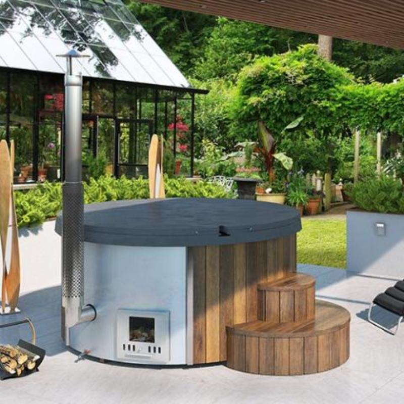 Wood-Fired Hot Tub S4N - on a concrete patio, in the shade of a backyard with trees