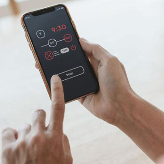 Saunum AirIQ Wi-Fi - hands holding it in use