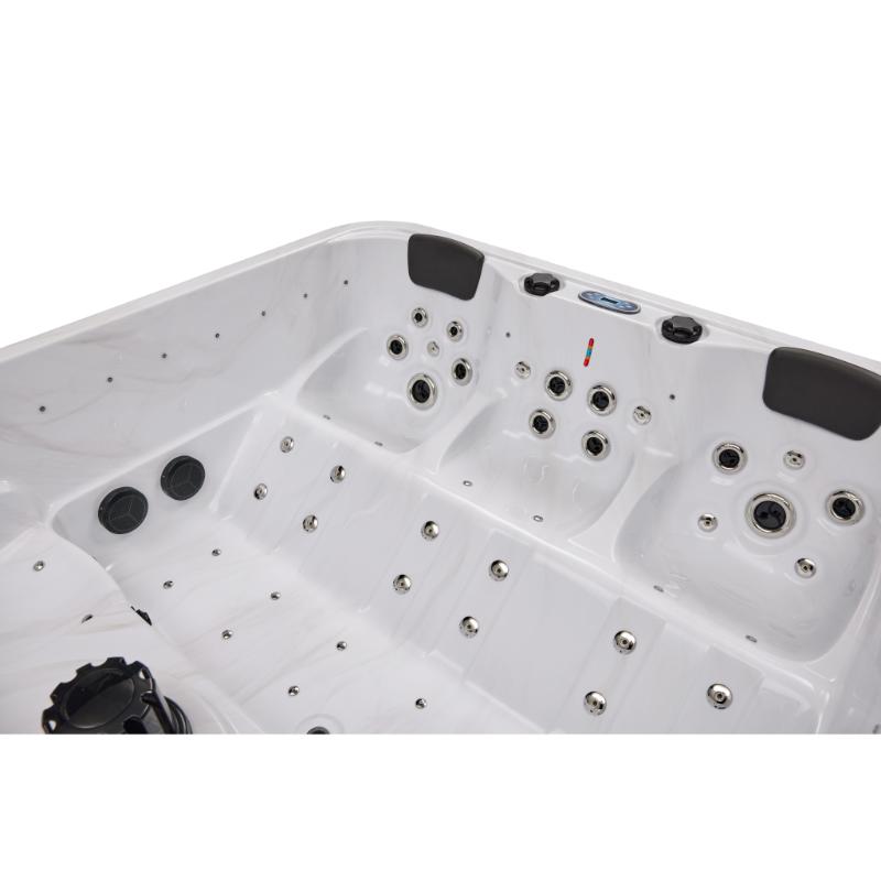 Social 5 Person Hot Tub - angled view of the interior without water. Showing jets, headrests, seating and filter.