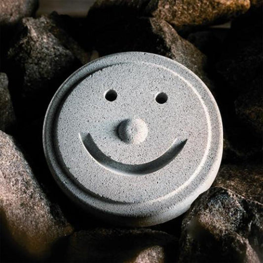 Hukka Sauna Smiley Stone in rocks