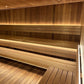 Wooden sauna interior with benches and paneling