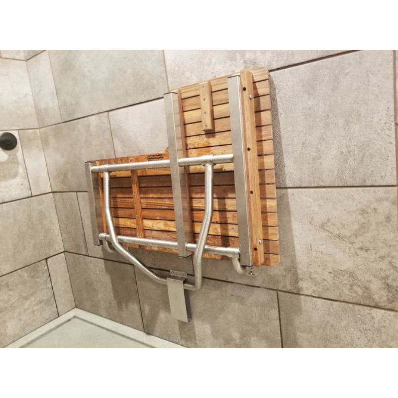 L-shaped Teak Shower Seat - ADA Compliant - right side folded up in a different shower