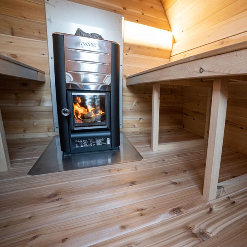 Dundalk MiniPOD 4 Person Outdoor Traditional Steam Sauna CTC77MW - wood-burning stove in use